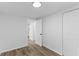 Neutral bedroom with wood floors, a closet, and white walls at 1915 Quitman St, North Charleston, SC 29405