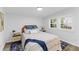 Cozy bedroom with natural light and light colored walls at 1915 Quitman St, North Charleston, SC 29405