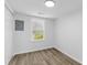 Neutral bedroom with wood floors and a bright window at 1915 Quitman St, North Charleston, SC 29405