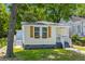 Adorable bungalow with flower boxes and a small front porch at 1915 Quitman St, North Charleston, SC 29405