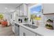 Bright kitchen with white cabinets and quartz countertops at 1915 Quitman St, North Charleston, SC 29405