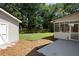 Backyard featuring lush lawn, storage shed, and screened-in porch at 2009 Arundel Pl, Mount Pleasant, SC 29464