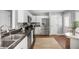 Well-equipped kitchen boasting stainless steel appliances, spacious countertops, and convenient access to the dining area at 2009 Arundel Pl, Mount Pleasant, SC 29464
