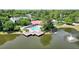 Aerial view of the community clubhouse and pool overlooking a pond with a fountain at 2011 N Highway 17 # 1400P, Mount Pleasant, SC 29466