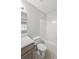 Bright bathroom showcasing white tiled shower-tub combo and wood vanity at 2011 N Highway 17 # 1400P, Mount Pleasant, SC 29466
