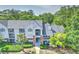 Aerial view of condo building surrounded by lush greenery at 2011 N Highway 17 # 1400P, Mount Pleasant, SC 29466