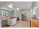 Bright kitchen featuring stainless steel appliances and a butcher block island with cooktop at 2021 Lakeshore Dr, Charleston, SC 29412