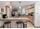 Bright kitchen featuring wooden cabinetry, ample counter space, and modern appliances at 2021 Lakeshore Dr, Charleston, SC 29412