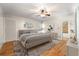 Comfortable main bedroom with a neutral color scheme and hardwood floors at 2021 Lakeshore Dr, Charleston, SC 29412