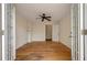 Home office with hardwood floors, neutral walls, and a ceiling fan at 2021 Lakeshore Dr, Charleston, SC 29412