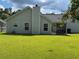 Spacious backyard of home featuring verdant grass, perfect for outdoor activities and relaxation at 232 Moon Dance Ln, Summerville, SC 29483