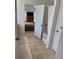 En-suite bathroom with tiled floor, walk in shower and doorway to the main bedroom at 232 Moon Dance Ln, Summerville, SC 29483