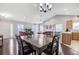 View of the dining area, kitchen, and living room in an open concept floor plan at 232 Moon Dance Ln, Summerville, SC 29483