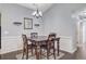 Dining area with dark wood table and a decorative mirror at 232 Moon Dance Ln, Summerville, SC 29483