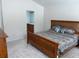 Comfortable bedroom with natural wood furniture and an en-suite bathroom at 232 Moon Dance Ln, Summerville, SC 29483