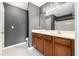 Well-maintained bathroom featuring a modern vanity, sizable mirror, and a shower-tub combination at 234 S Lamplighter Ln, Summerville, SC 29486