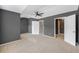 Spacious primary bedroom with vaulted ceiling and neutral carpeting, ready for your personal touch at 234 S Lamplighter Ln, Summerville, SC 29486