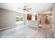Open living space with hardwood floors seamlessly flowing into the kitchen area at 234 S Lamplighter Ln, Summerville, SC 29486