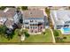 Aerial view of a beautiful home featuring multiple decks, patio, and large yard at 2668 Crooked Stick Ln, Mount Pleasant, SC 29466