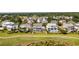 Aerial view showcasing the beautiful homes near a golf course in a scenic neighborhood at 2668 Crooked Stick Ln, Mount Pleasant, SC 29466