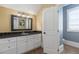 Bright bathroom features granite counters, white cabinets, tile floors and great lighting at 2668 Crooked Stick Ln, Mount Pleasant, SC 29466