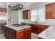 Gourmet kitchen featuring granite countertops, stainless steel appliances, and custom cabinetry at 2668 Crooked Stick Ln, Mount Pleasant, SC 29466