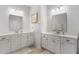 Bathroom features double sinks, white cabinetry, and neutral walls at 2722 Sunrose Ln, Johns Island, SC 29455