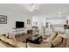 Spacious living room offering an open layout to the kitchen and dining area, ideal for entertaining guests at 2722 Sunrose Ln, Johns Island, SC 29455