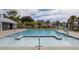 Community pool features zero entry area and is surrounded by lounge chairs at 2722 Sunrose Ln, Johns Island, SC 29455
