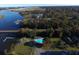 Aerial view of community pool near the water and next to train tracks with bridges and foliage at 2847 Limestone Blvd, Charleston, SC 29414