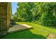 Nice backyard with well-maintained lawn, mature trees, new wooden deck providing a serene outdoor space at 2847 Limestone Blvd, Charleston, SC 29414
