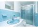 Charming bathroom features colorful tile, a shower with glass doors, and vanity with mirror at 2847 Limestone Blvd, Charleston, SC 29414