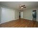 Spacious bedroom featuring hardwood floors, neutral paint, ceiling fan, and a large closet at 2847 Limestone Blvd, Charleston, SC 29414