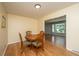 Cozy dining area with hardwood floors, a round wood table and four chairs at 2847 Limestone Blvd, Charleston, SC 29414