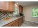 Beautiful kitchen with mosaic tile backsplash, granite countertops, and stainless steel appliances at 2847 Limestone Blvd, Charleston, SC 29414