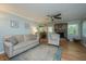 Cozy living room with a brick fireplace, hardwood floors, and natural light at 2847 Limestone Blvd, Charleston, SC 29414