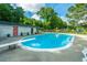 Community pool with lifeguard station, lush landscaping and bathhouse with diving board at 2847 Limestone Blvd, Charleston, SC 29414