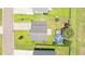Aerial view of the property featuring a pool, surrounding neighborhood, and ample green backyard space at 302 Mossy Wood Rd, Summerville, SC 29483