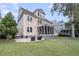 Expansive backyard featuring a screened-in porch, outdoor patio, and ample green space perfect for entertaining at 3020 River Vista Way, Mount Pleasant, SC 29466