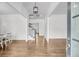 Bright foyer with hardwood floors, staircase, and open sightlines offering a welcoming entrance at 3020 River Vista Way, Mount Pleasant, SC 29466