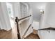 A wood staircase leading to the upper level, showcasing the home's design at 3020 River Vista Way, Mount Pleasant, SC 29466