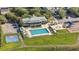 Aerial view of community amenities including pool, playground, basketball court, clubhouse, and parking at 312 Barberry St, Summerville, SC 29483