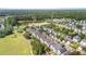 Aerial view of a community with a pool and pond at 312 Barberry St, Summerville, SC 29483