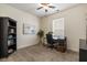 Bedroom featuring a ceiling fan, a large window, and neutral-colored carpet at 312 Barberry St, Summerville, SC 29483