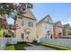 Charming two-story home with yellow siding, white trim, and a well-maintained front yard at 312 Barberry St, Summerville, SC 29483