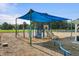 Well-equipped playground with a sunshade, slide, climbing structures, and swings for enjoyment at 312 Barberry St, Summerville, SC 29483