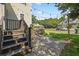 Backyard featuring patio pavers, retaining wall, and stairs with backyard overlooking neighborhood at 312 Kelsey Blvd, Wando, SC 29492