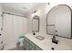 Bright bathroom features a double sink vanity, modern fixtures, and neutral finishes for a clean, updated look at 312 Kelsey Blvd, Wando, SC 29492