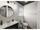 Bathroom features a shower and tub with a dark framed mirror and a contrasting color scheme at 312 Kelsey Blvd, Wando, SC 29492