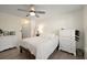 Bright bedroom with ceiling fan, and light-colored walls and flooring at 312 Kelsey Blvd, Wando, SC 29492